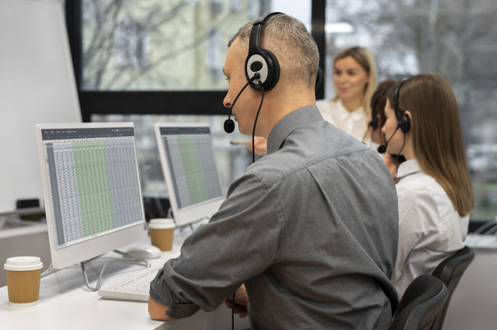 colleagues working together call center with headphones