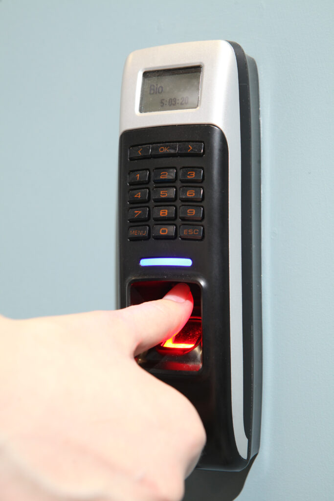 finger scan security for entry server room. an fingerprint machine server safety